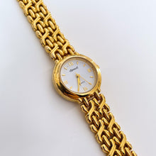 Load image into Gallery viewer, Vintage Ladies' Ingersoll Quartz Watch with Intricate Gold-Tone Bracelet and White Dial