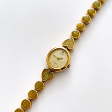 Load image into Gallery viewer, Vintage 1990s Gold-Tone Ladies' Seiko Alba Quartz Watch With Heart Pattern
