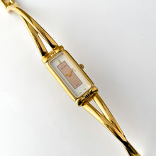 Load image into Gallery viewer, Vintage 1990s Gold-Plated Ladies' Nina Ricci Bangle Quartz Watch with Rectangular Dial