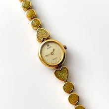 Load image into Gallery viewer, Vintage 1990s Gold-Tone Ladies' Seiko Alba Quartz Watch With Heart Pattern