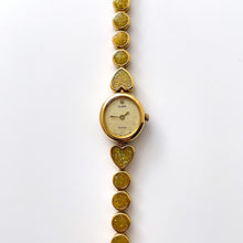 Load image into Gallery viewer, Vintage 1990s Gold-Tone Ladies' Seiko Alba Quartz Watch With Heart Pattern