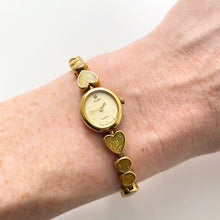 Load image into Gallery viewer, Vintage 1990s Gold-Tone Ladies' Seiko Alba Quartz Watch With Heart Pattern