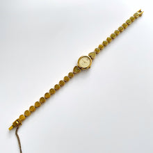Load image into Gallery viewer, Vintage 1990s Gold-Tone Ladies' Seiko Alba Quartz Watch With Heart Pattern