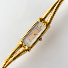 Load image into Gallery viewer, Vintage 1990s Gold-Plated Ladies' Nina Ricci Bangle Quartz Watch with Rectangular Dial