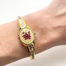 Load image into Gallery viewer, Vintage André Mouche Quartz Watch - Burgundy Floral Design, Concealed Dial, Gold-Plated