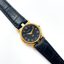 Load image into Gallery viewer, 90s Gold-Plated Ladies' Gucci Quartz Watch with Black Leather Strap - Boxed