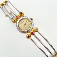 Load image into Gallery viewer, Very Rare 1990s Two-Tone Seiko Articulated Bangle Quartz Watch with Three Coloured Gemstones