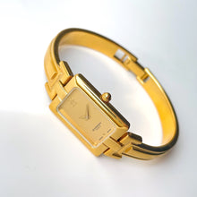 Load image into Gallery viewer, Vintage 1990s Gold-Plated Ladies' Givenchy Bangle Quartz Watch with Rectangular Dial