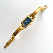 Load image into Gallery viewer, Vintage 1990s Gold-Plated Ladies' Givenchy Bangle Watch with Blue Dial and Quartz Movement
