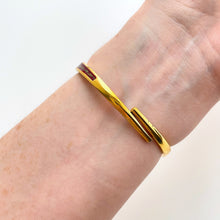 Load image into Gallery viewer, Vintage André Mouche Quartz Watch with Burgundy Enamel Floral Design, Concealead Dial and Gold-Plated Bangle Bracelet