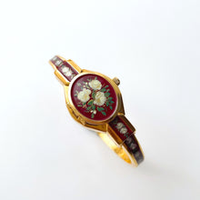Load image into Gallery viewer, Vintage André Mouche Quartz Watch with Burgundy Enamel Floral Design, Concealead Dial and Gold-Plated Bangle Bracelet