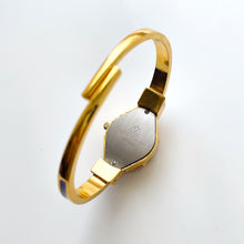 Load image into Gallery viewer, Vintage André Mouche Crystal-Set Quartz Watch with Green and Navy Enamel Floral Design, Concealead Dial and Gold-Plated Bangle Bracelet