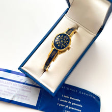 Load image into Gallery viewer, Vintage André Mouche Quartz Watch with Gold and Navy Enamel Floral Design, Concealead Dial and Gold-Plated Bangle Bracelet