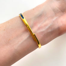 Load image into Gallery viewer, Vintage André Mouche Quartz Watch with Gold and Navy Enamel Floral Design, Concealead Dial and Gold-Plated Bangle Bracelet