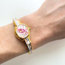 Load image into Gallery viewer, Vintage André Mouche Quartz Watch with White & Pink Enamel Floral Design, Concealead Dial and Gold-Plated Bangle Bracelet