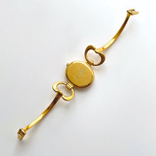 Load image into Gallery viewer, 1990s Gucci Quartz Watch with Mother of Pearl Dial and Semi Bangle Bracelet