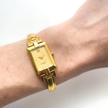 Load image into Gallery viewer, Vintage 1990s Gold-Plated Ladies' Givenchy Bangle Quartz Watch with Rectangular Dial