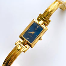 Load image into Gallery viewer, Vintage 1990s Gold-Plated Ladies' Givenchy Bangle Watch with Blue Dial and Quartz Movement