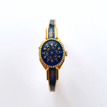 Load image into Gallery viewer, Vintage André Mouche Quartz Watch with Gold and Navy Enamel Floral Design, Concealead Dial and Gold-Plated Bangle Bracelet
