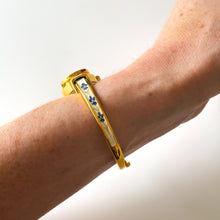 Load image into Gallery viewer, Vintage André Mouche Quartz Watch with Beige and Blue Enamel Floral Design, Concealead Dial and Gold-Plated Bangle Bracelet