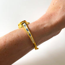 Load image into Gallery viewer, Vintage André Mouche Quartz Watch with Beige and Blue Enamel Floral Design, Concealead Dial and Gold-Plated Bangle Bracelet