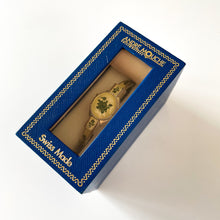 Load image into Gallery viewer, Vintage André Mouche Quartz Watch with Pink Enamel Floral Design, Concealead Dial and Silver Tone Bangle Bracelet