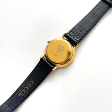 Load image into Gallery viewer, 90s Gold-Plated Gucci Quartz Watch with Black Leather Strap