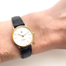 Load image into Gallery viewer, Vintage 1990s Gold-Plated Ladies' Givenchy Quartz Watch with Black Leather Strap