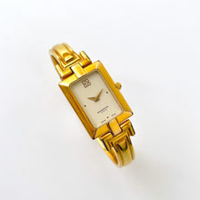 Load image into Gallery viewer, Vintage 1990s Gold-Plated Ladies' Givenchy Bangle Quartz Watch with Rectangular Dial