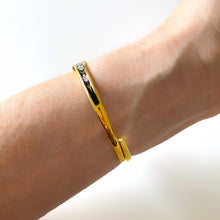 Load image into Gallery viewer, Vintage André Mouche Quartz Watch with Black and Purple Enamel Floral Design, Concealead Dial and Gold-Plated Bangle Bracelet