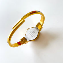 Load image into Gallery viewer, Vintage André Mouche Quartz Watch with Black and Purple Enamel Floral Design, Concealead Dial and Gold-Plated Bangle Bracelet