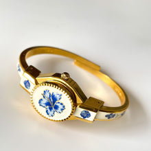 Load image into Gallery viewer, Vintage André Mouche Quartz Watch with Beige and Blue Enamel Floral Design, Concealead Dial and Gold-Plated Bangle Bracelet
