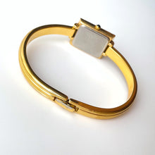 Load image into Gallery viewer, Vintage 90s Yves Saint Laurent Ladies' Bangle Style Quartz Watch with Gold-Tone Bracelet and Green Dial