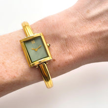 Load image into Gallery viewer, Vintage 90s Yves Saint Laurent Ladies' Bangle Style Quartz Watch with Gold-Tone Bracelet and Green Dial
