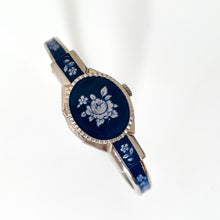 Load image into Gallery viewer, Vintage André Mouche Quartz Watch with Navy Enamel Floral Design, Concealead Dial and Silver-Tone Bangle Bracelet