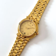Load image into Gallery viewer, Vintage Gold-Plated Gucci Quartz Watch with Round Dial and Date Window