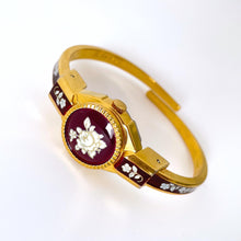 Load image into Gallery viewer, Vintage André Mouche Quartz Watch with Burgundy Enamel Floral Design, Concealead Dial and Gold-Plated Bangle Bracelet