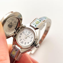 Load image into Gallery viewer, Vintage André Mouche Quartz Watch with Light Blue Enamel Floral Design, Concealed Dial and Silver-Tone Bangle Bracelet