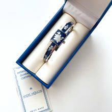 Load image into Gallery viewer, Vintage André Mouche Quartz Watch with Navy Enamel Floral Design, Concealed Dial and Stainless Steel Bangle Bracelet