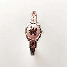 Load image into Gallery viewer, Vintage 1990s André Mouche Quartz Watch with Pink & Burgundy Enamel Floral Design, Concealed Dial and Silver-Tone Bangle Bracelet