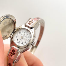 Load image into Gallery viewer, Vintage 1990s André Mouche Quartz Watch with Pink & Burgundy Enamel Floral Design, Concealed Dial and Silver-Tone Bangle Bracelet
