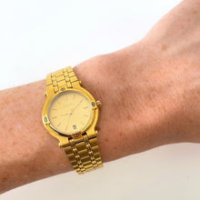 Load image into Gallery viewer, Vintage Gold-Plated Gucci Quartz Watch with Round Dial and Date Window