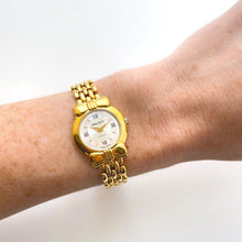 Load image into Gallery viewer, Vintage 1990s Gold-Plated Ladies' Nina Ricci Quartz Watch with Round Mother of Pearl Dial