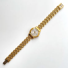 Load image into Gallery viewer, Vintage 1990s Gold-Plated Ladies' Nina Ricci Quartz Watch with Round Mother of Pearl Dial