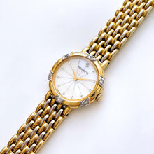Load image into Gallery viewer, Vintage 1990s Crystal-Set Gold-Plated Ladies' Nina Ricci Quartz Watch with Round Mother of Pearl Dial