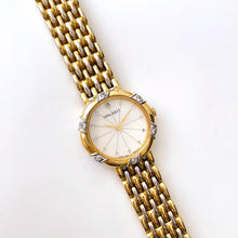 Load image into Gallery viewer, Vintage 1990s Crystal-Set Gold-Plated Ladies' Nina Ricci Quartz Watch with Round Mother of Pearl Dial