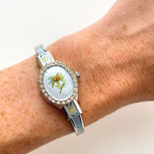 Load image into Gallery viewer, Vintage André Mouche Quartz Watch with Light Blue Enamel Floral Design, Concealed Dial and Silver-Tone Bangle Bracelet