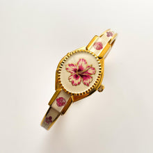 Load image into Gallery viewer, Vintage André Mouche Quartz Watch with Pink Enamel Floral Design, Concealed Dial and Gold-Plated Bangle Bracelet