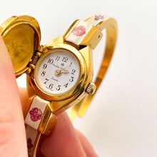 Load image into Gallery viewer, Vintage André Mouche Quartz Watch with Pink Enamel Floral Design, Concealed Dial and Gold-Plated Bangle Bracelet