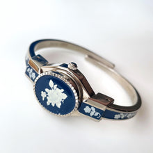 Load image into Gallery viewer, Vintage André Mouche Quartz Watch with Navy Enamel Floral Design, Concealed Dial and Silver-Tone Bangle Bracelet